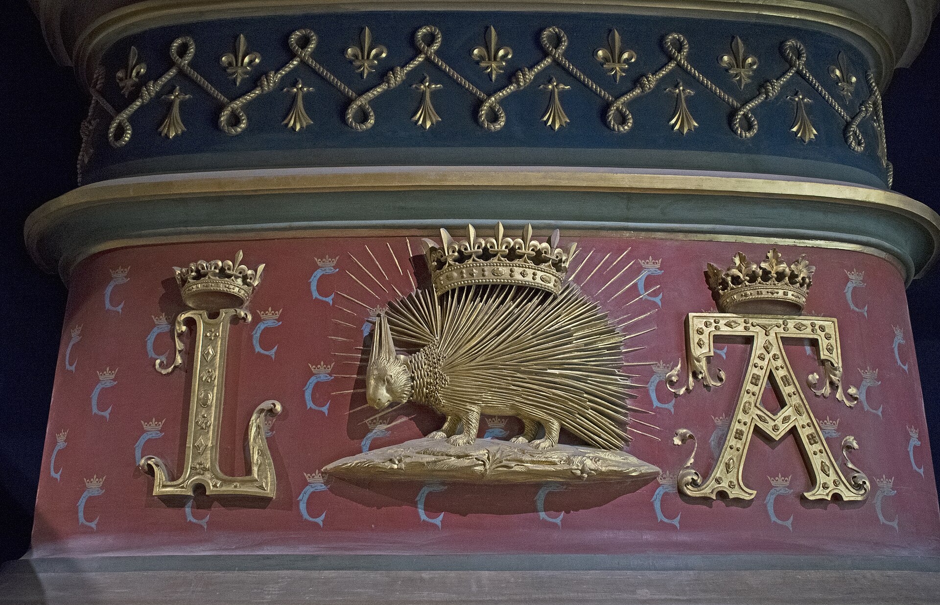 The porcupine, emblem of Louis XII, carved on a fireplace