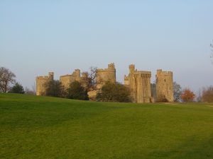 The castle sits low in the Rother valley, its walls seeming to grow straight out of the moat