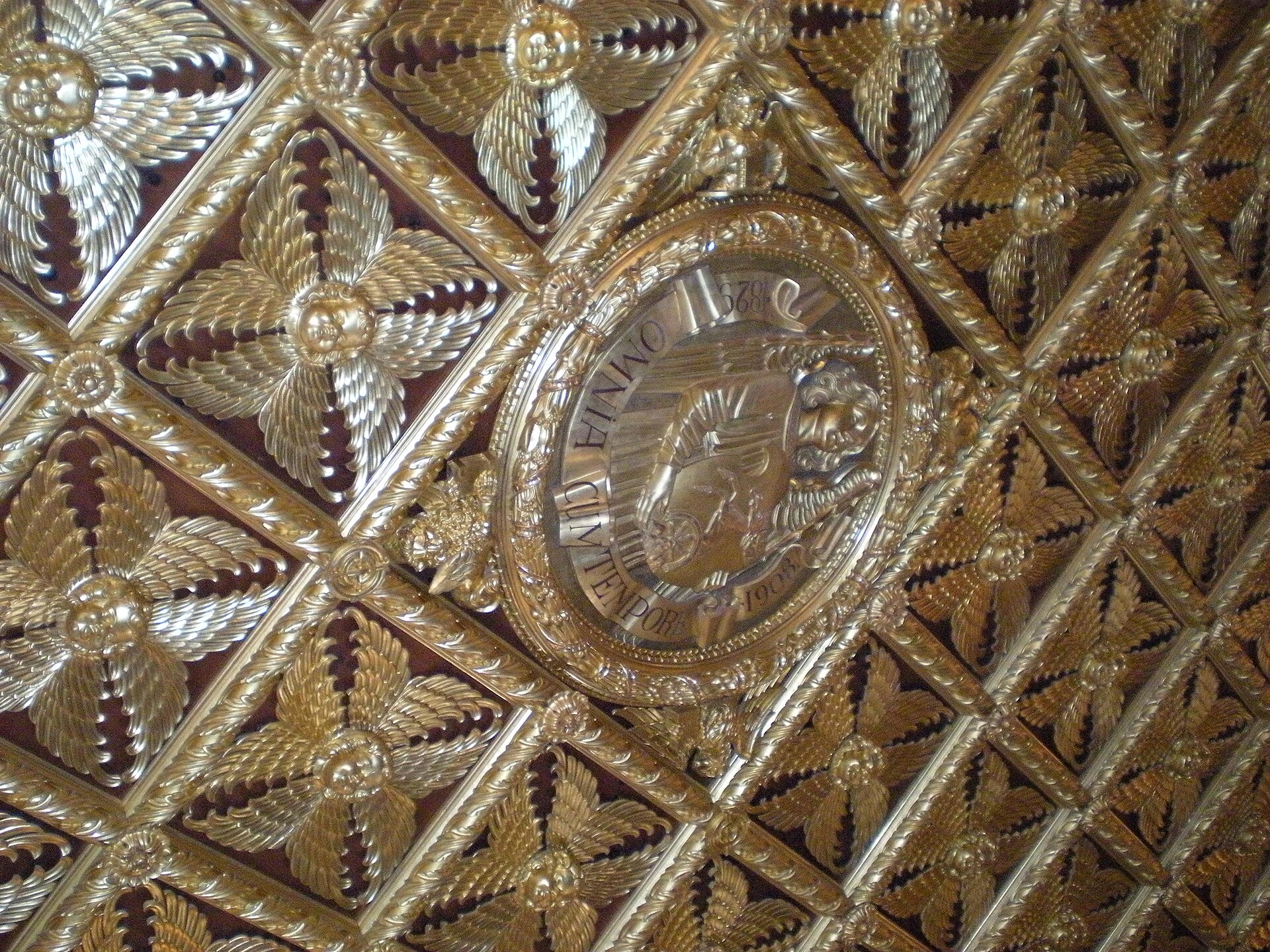 The Golden Hall dazzles with an elaborate carved and gilded wooden ceiling.