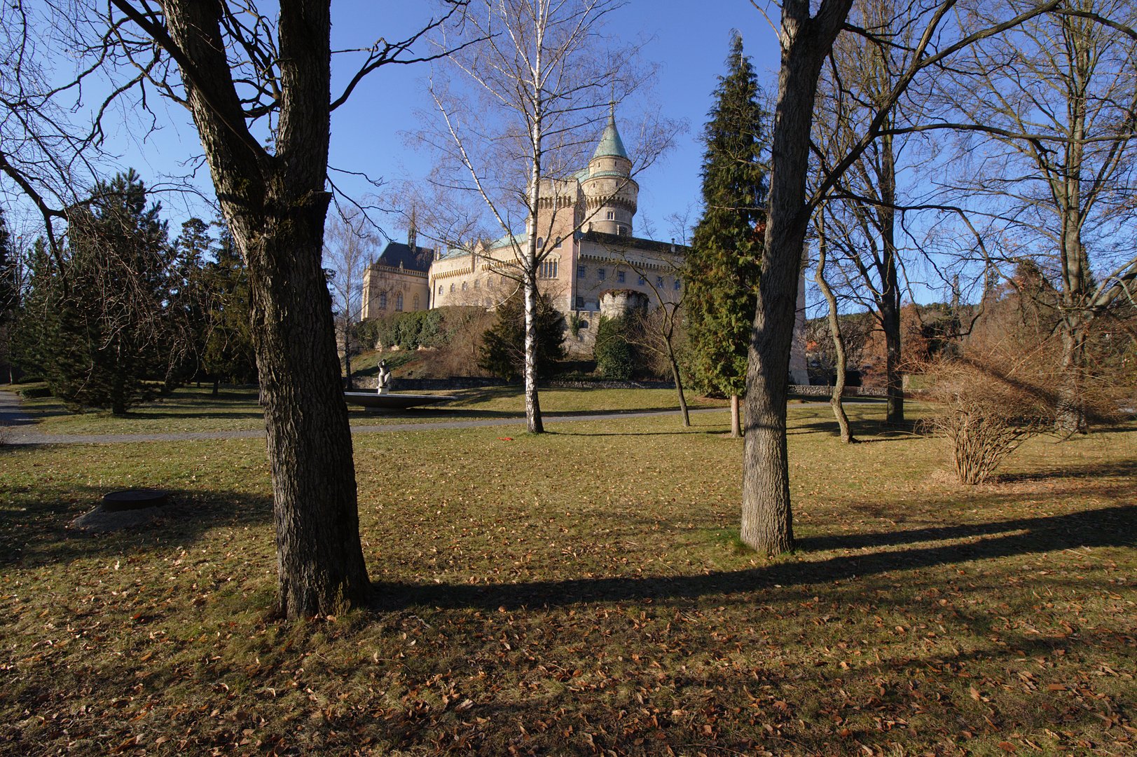 The castle grounds include landscaped parkland, the country's oldest zoo and a venerable linden tree.
