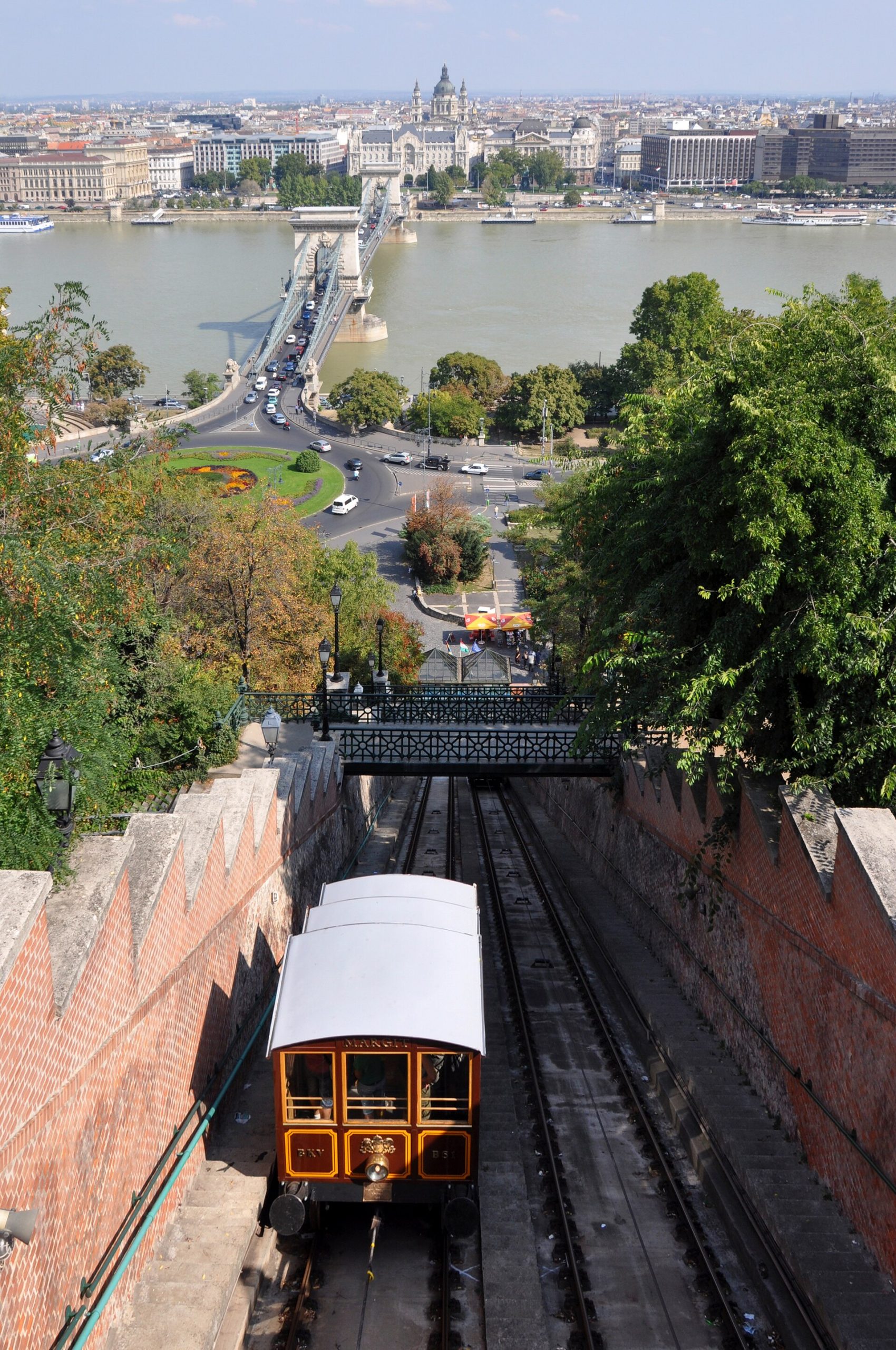 A historic funicular climbs Castle Hill, linking the river to the palace and the old town above.