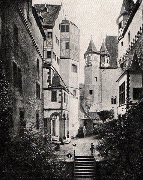 A historic photograph of the courtyard, little changed across the generations