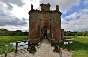 The moat and the modern approach bridge, echoing the water defences that once ringed the castle