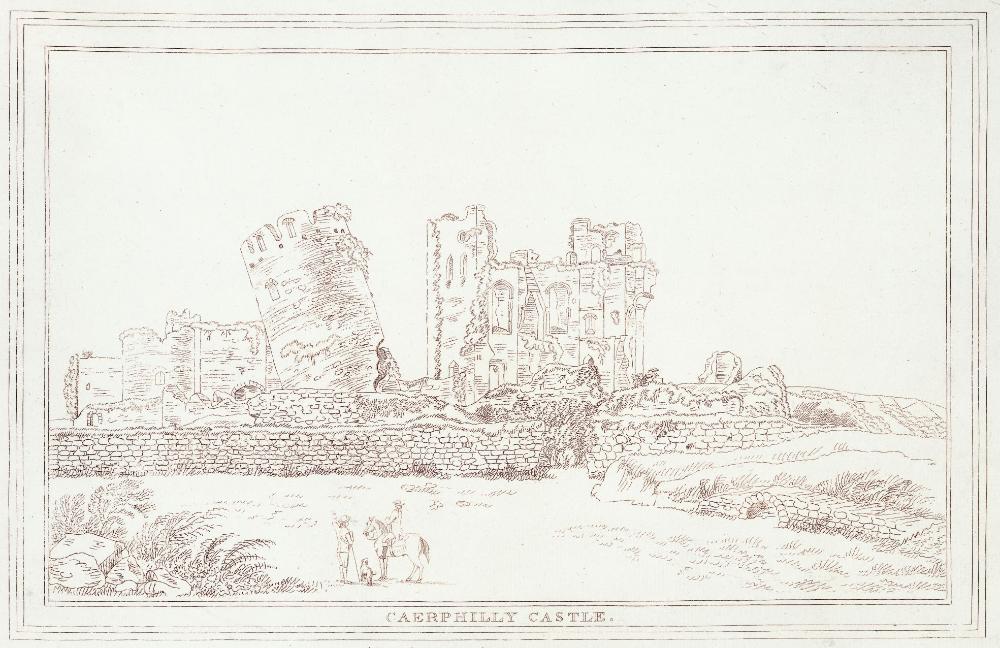 The castle's grey towers reflected in the still water of its moats and lakes