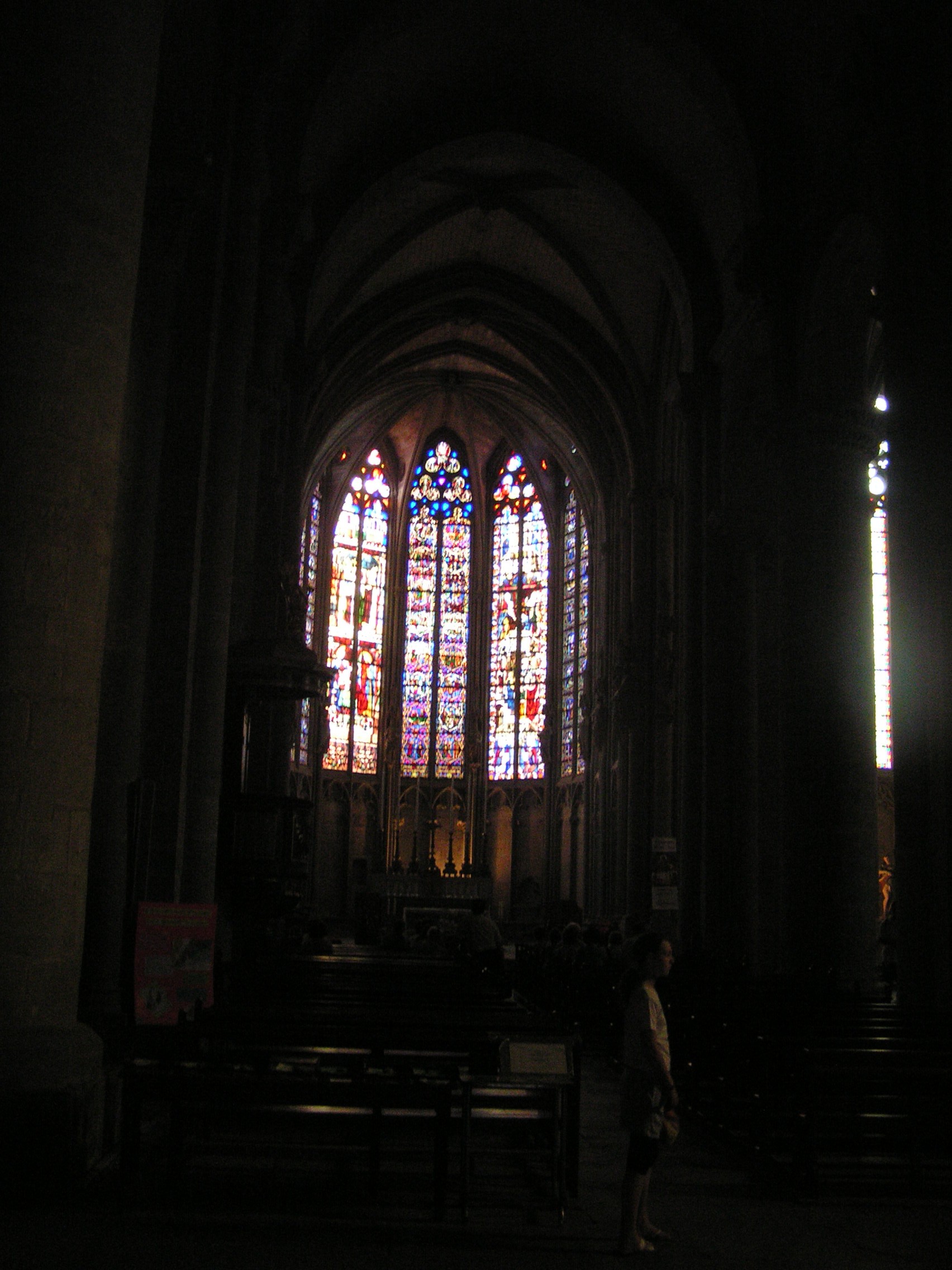 The glowing stained glass of the Basilica of Saint-Nazaire