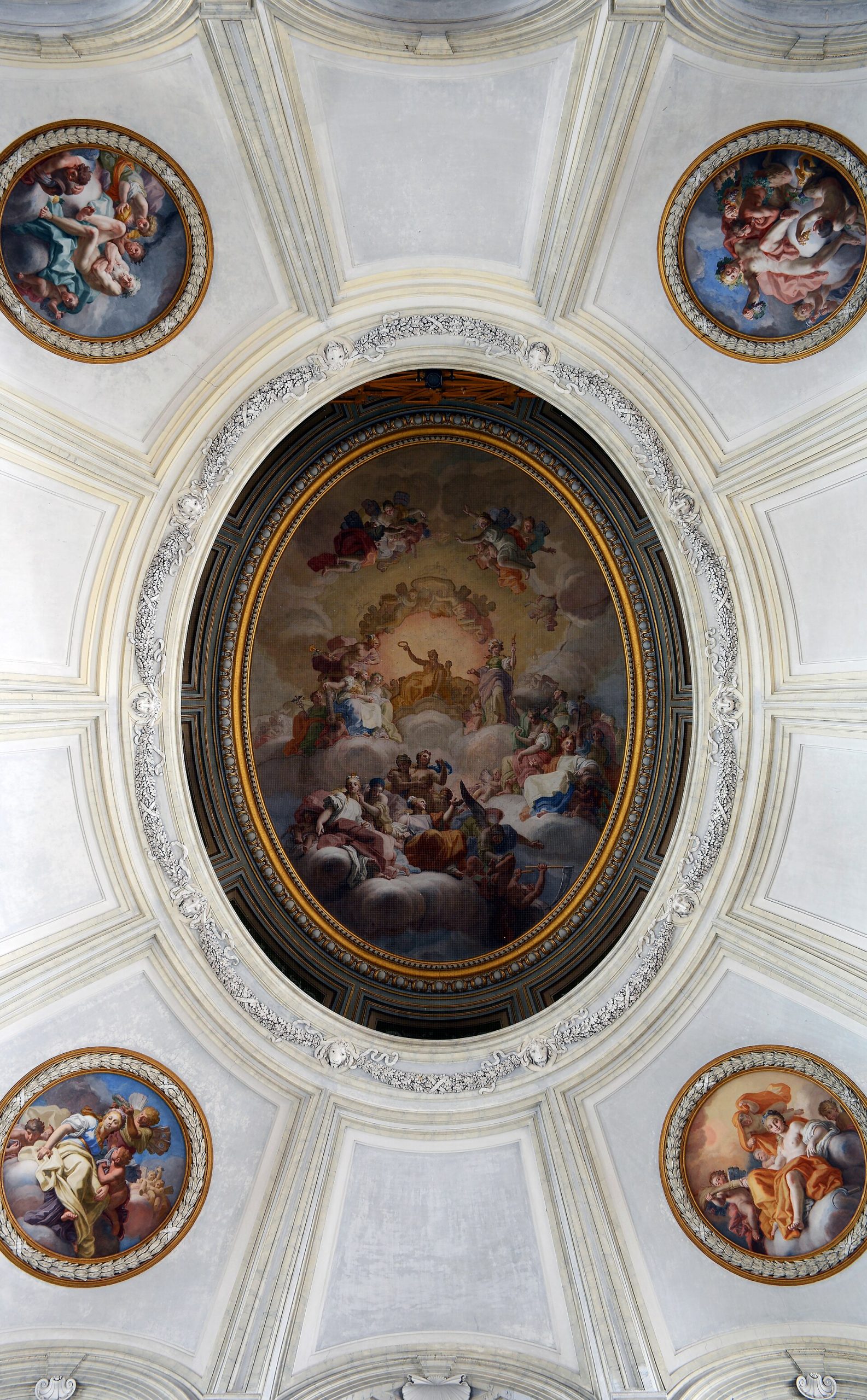 An ornate painted ceiling within the palace