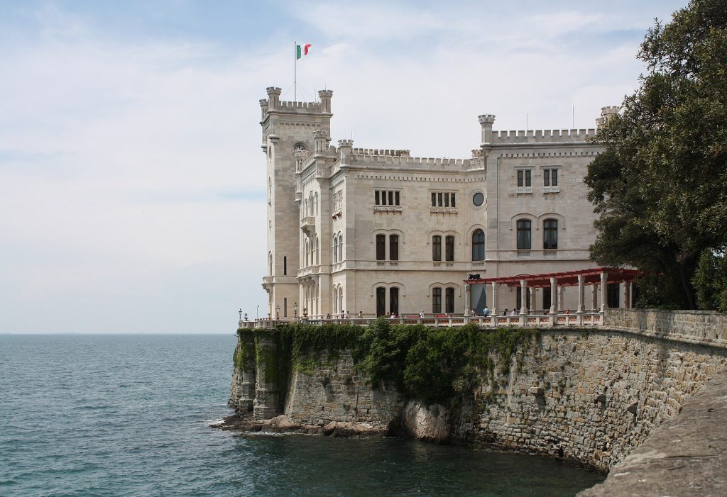 The white Castello di Miramare above the Gulf of Trieste