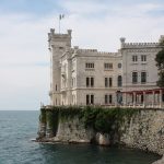 The white Castello di Miramare above the Gulf of Trieste