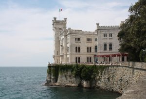 The white Castello di Miramare above the Gulf of Trieste
