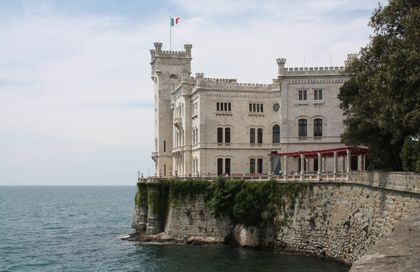 The white Castello di Miramare above the Gulf of Trieste