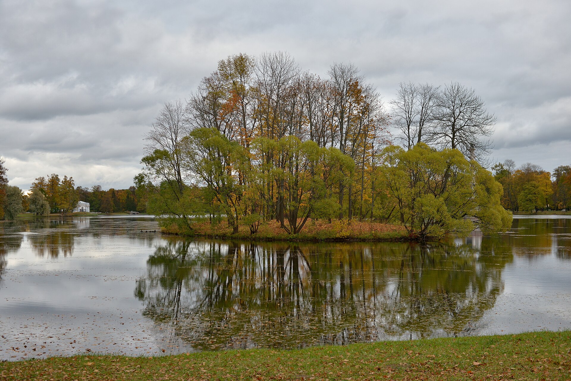 The palace seen across the park, framed by water and trees as its designers intended.
