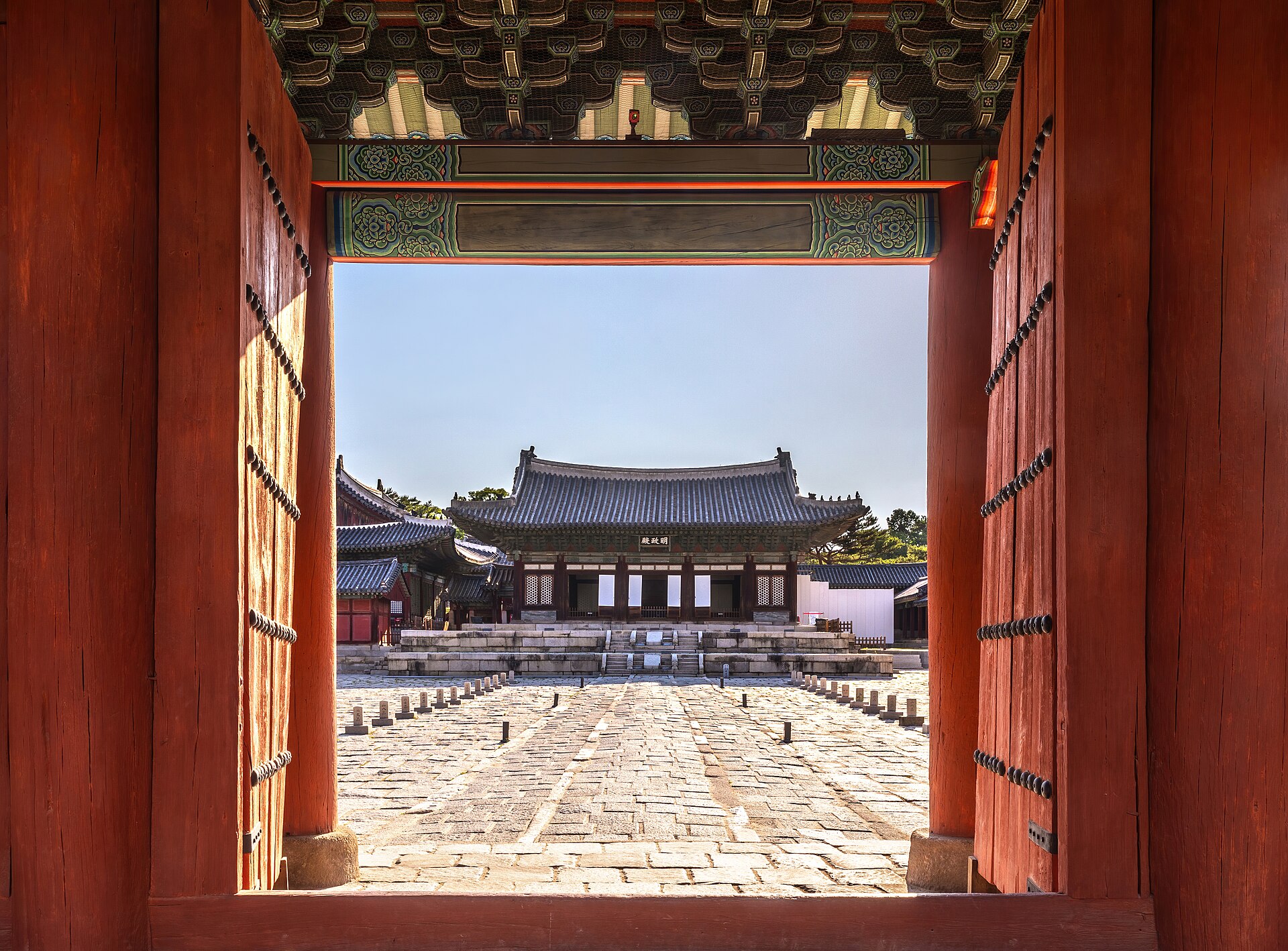 Myeongjeongjeon, the ancient throne hall, glimpsed through a gate