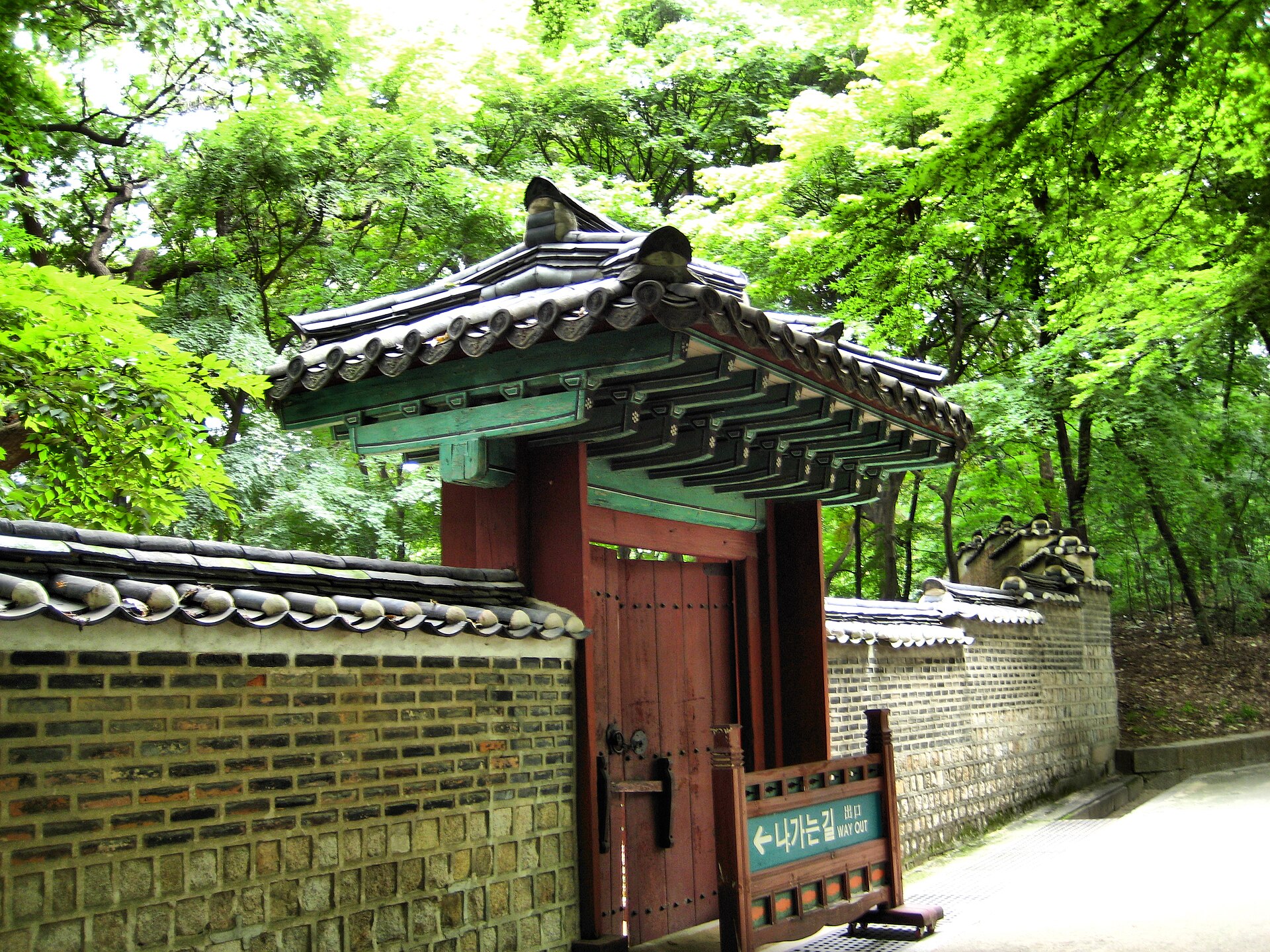 A pond and pavilion in the Secret Garden, a jewel of Korean landscape design.