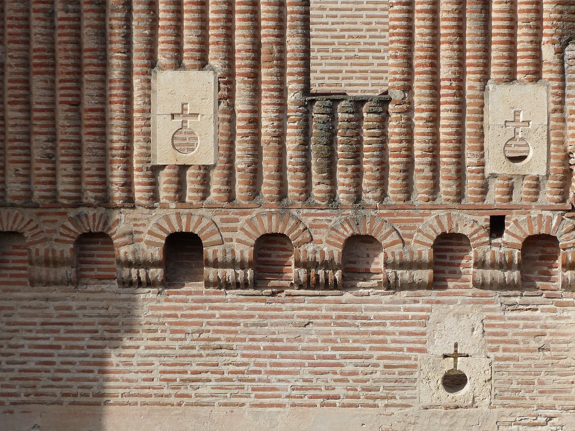Powerful towers rise at the corners, crowned with smaller turrets.