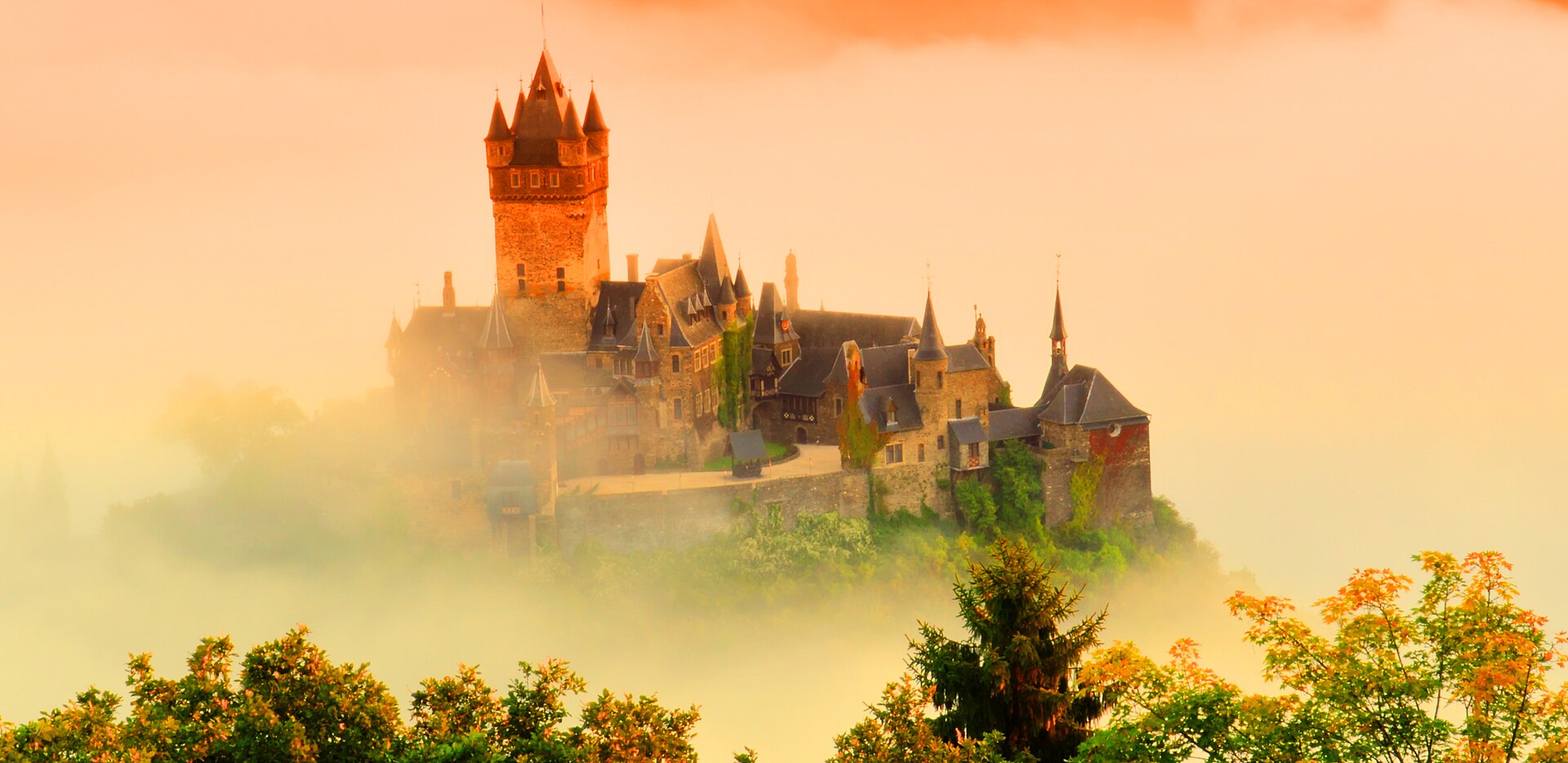 The castle rock shrouded in fog, as the ruins stood for nearly two hundred years