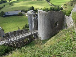 The broken gatehouse and bridge, blasted apart when the castle was slighted after the Civil War