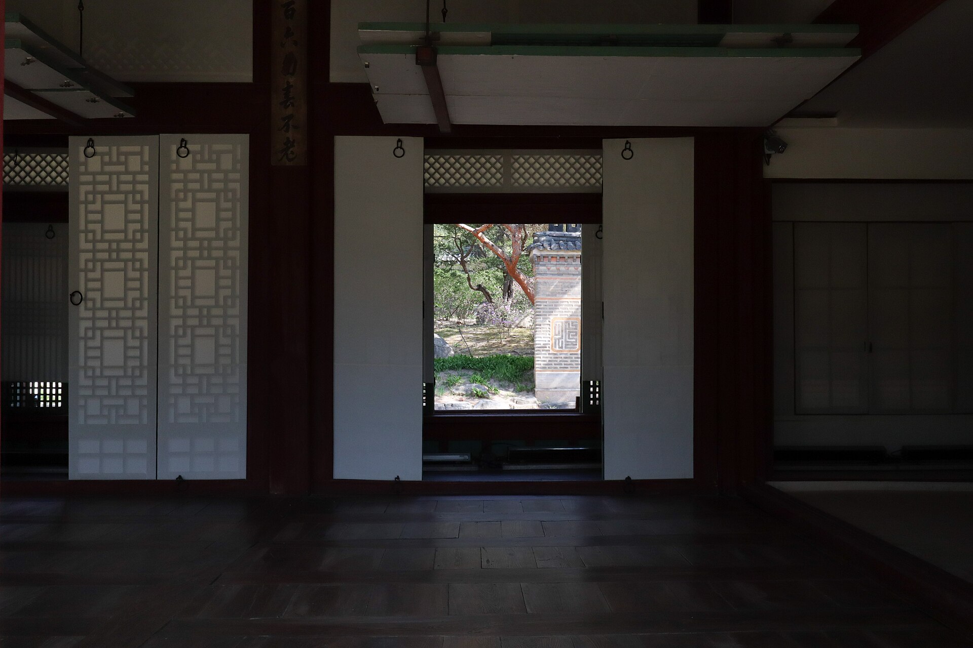 Painted eaves and tiled roofs of the traditional halls