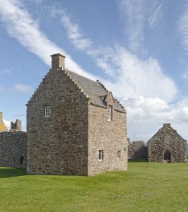 Dunnottar spread across its clifftop, a whole fortified complex above the sea