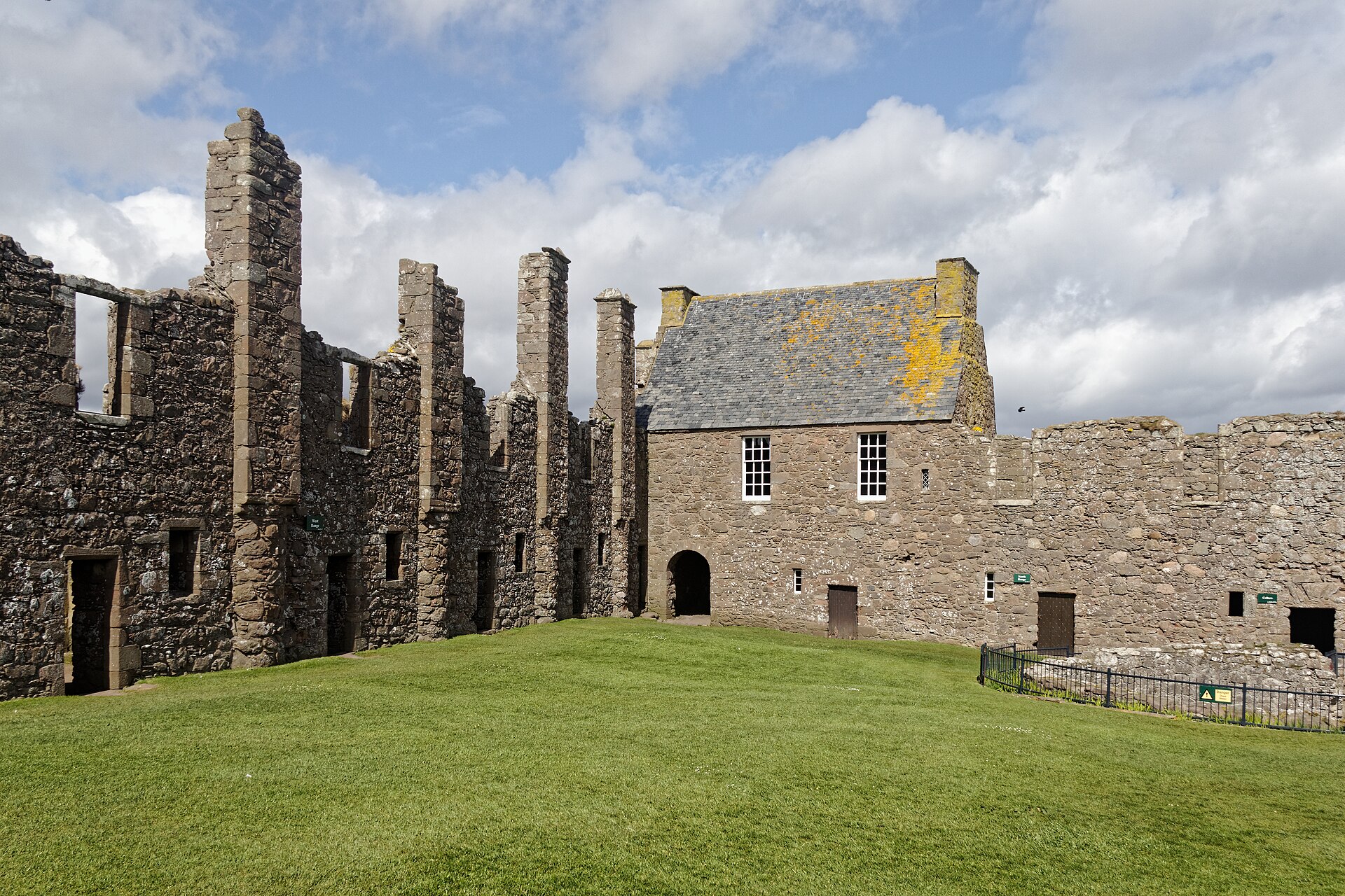 The castle from the landward side, its defences making the most of the plunging cliffs