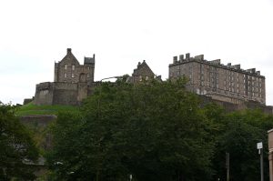 Edinburgh Castle towering over the city on its ancient volcanic rock, the most besieged place in Britain
