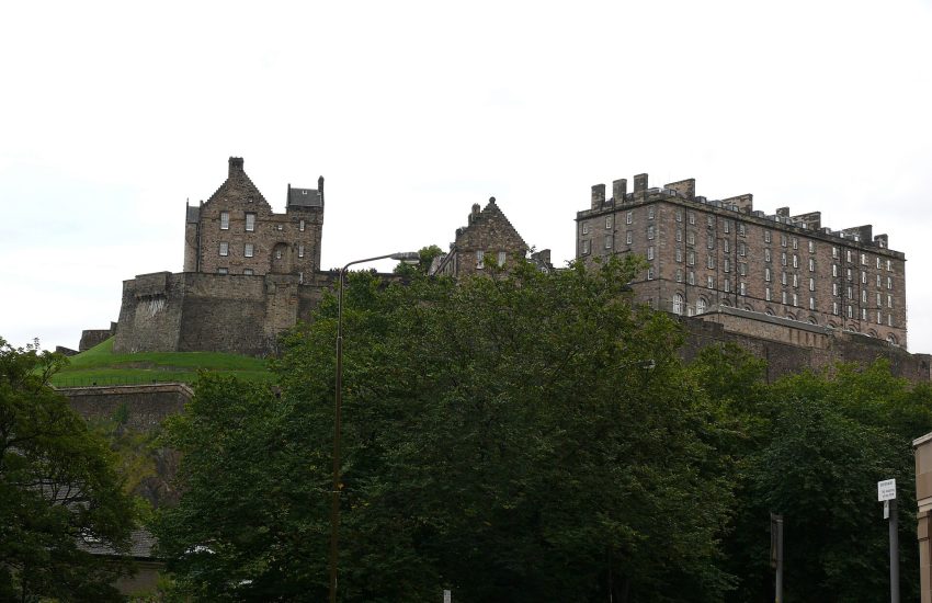 Edinburgh Castle towering over the city on its ancient volcanic rock, the most besieged place in Britain