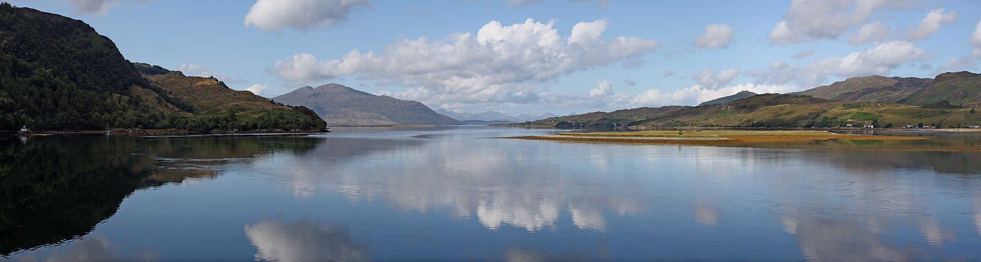 Eilean Donan Castle on its little island where three sea lochs meet, one of the most photographed castles in the world