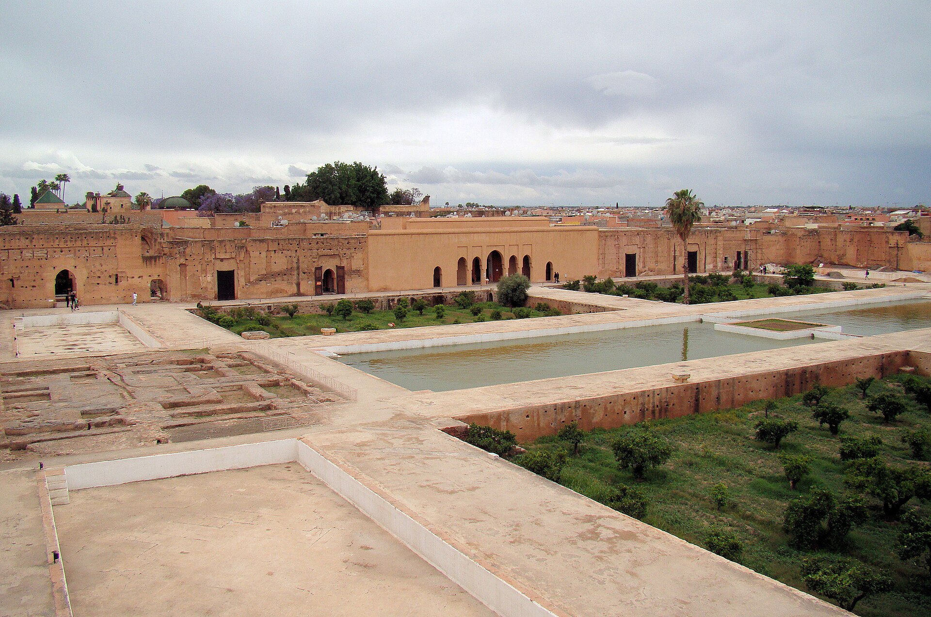 The bare red walls of the palace seen from the ramparts