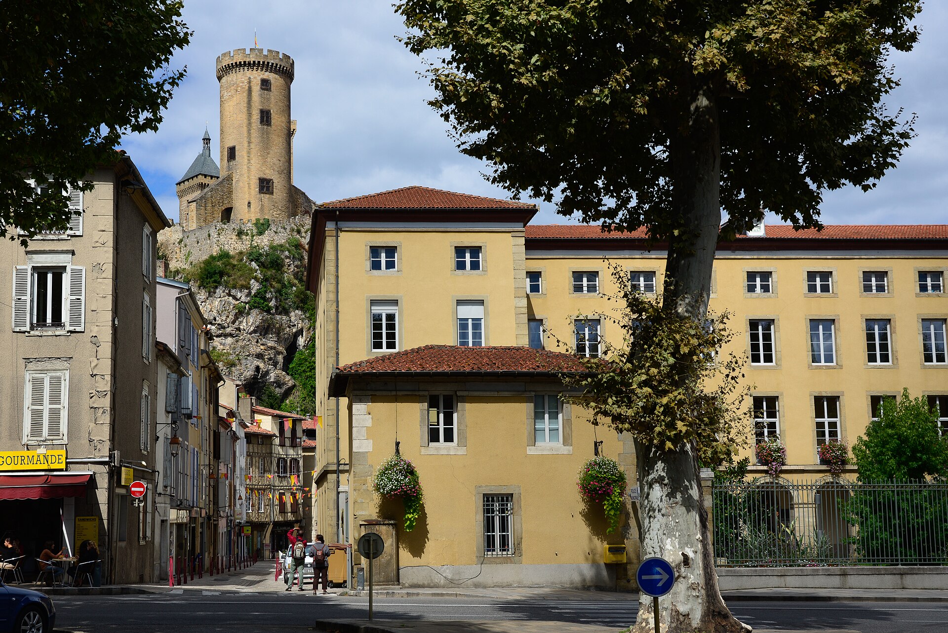 The three towers seen from the streets of the town below