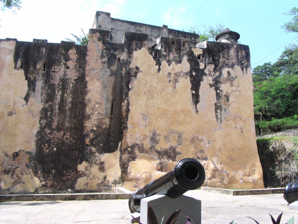 The coral-stone ramparts and cannon of the fortress