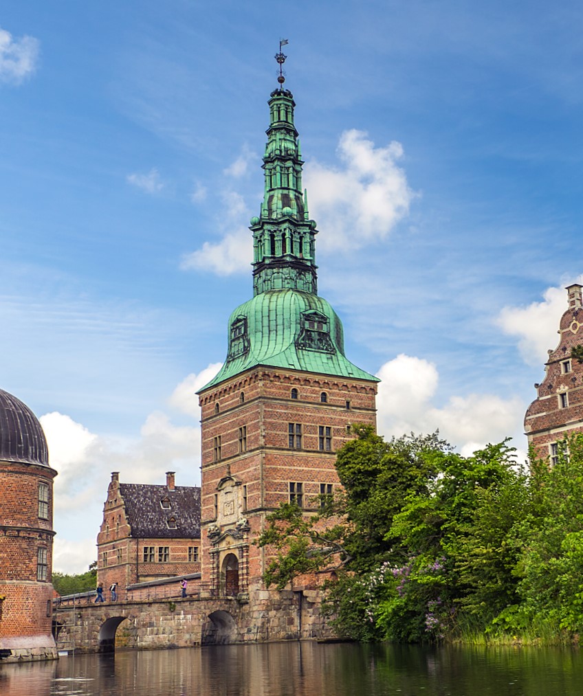 Ornate gate towers and bridges lead the visitor across the islands to the heart of the palace.
