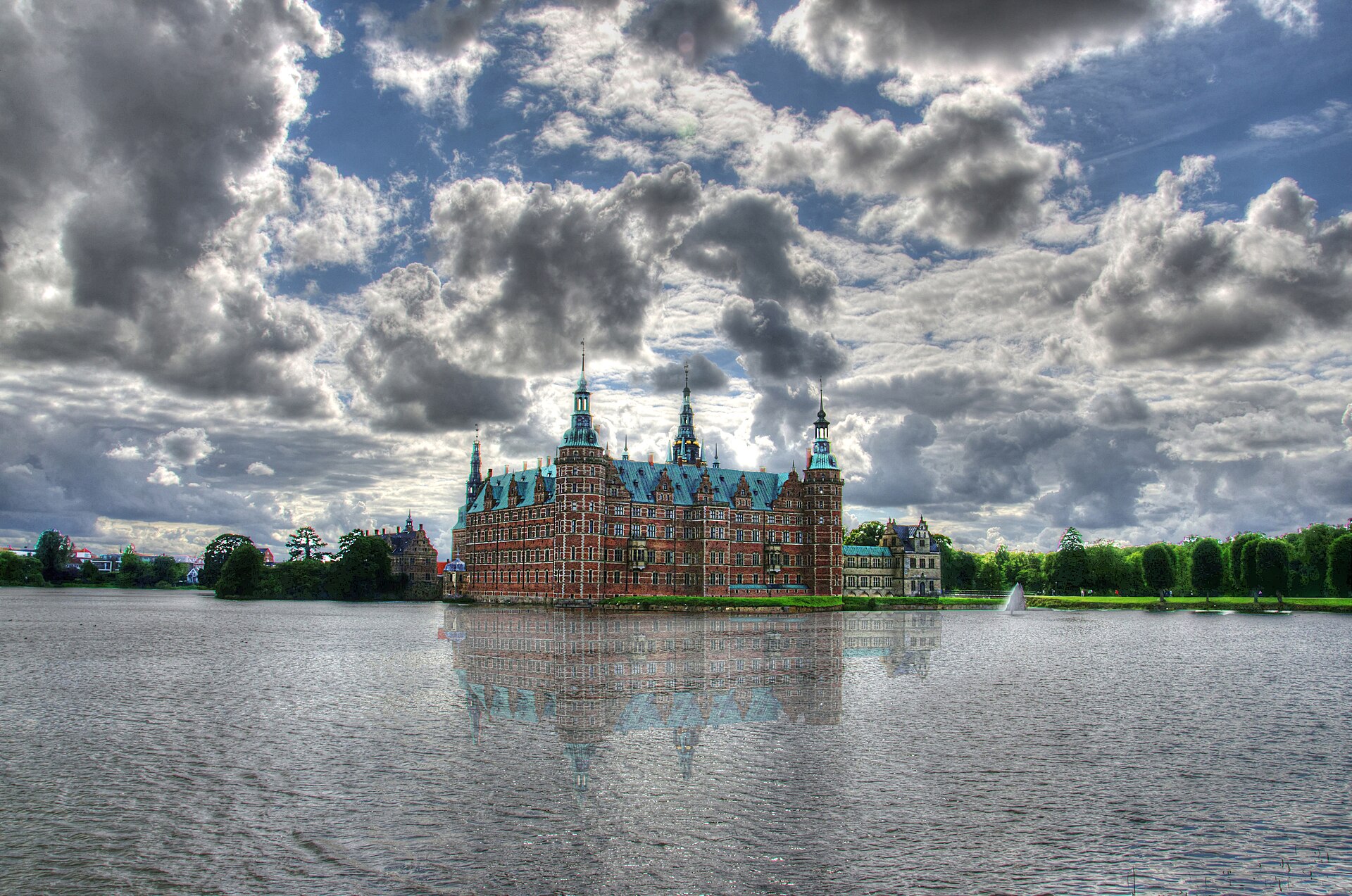 Frederiksborg rises on three islands in a lake, the largest Renaissance palace in Scandinavia.