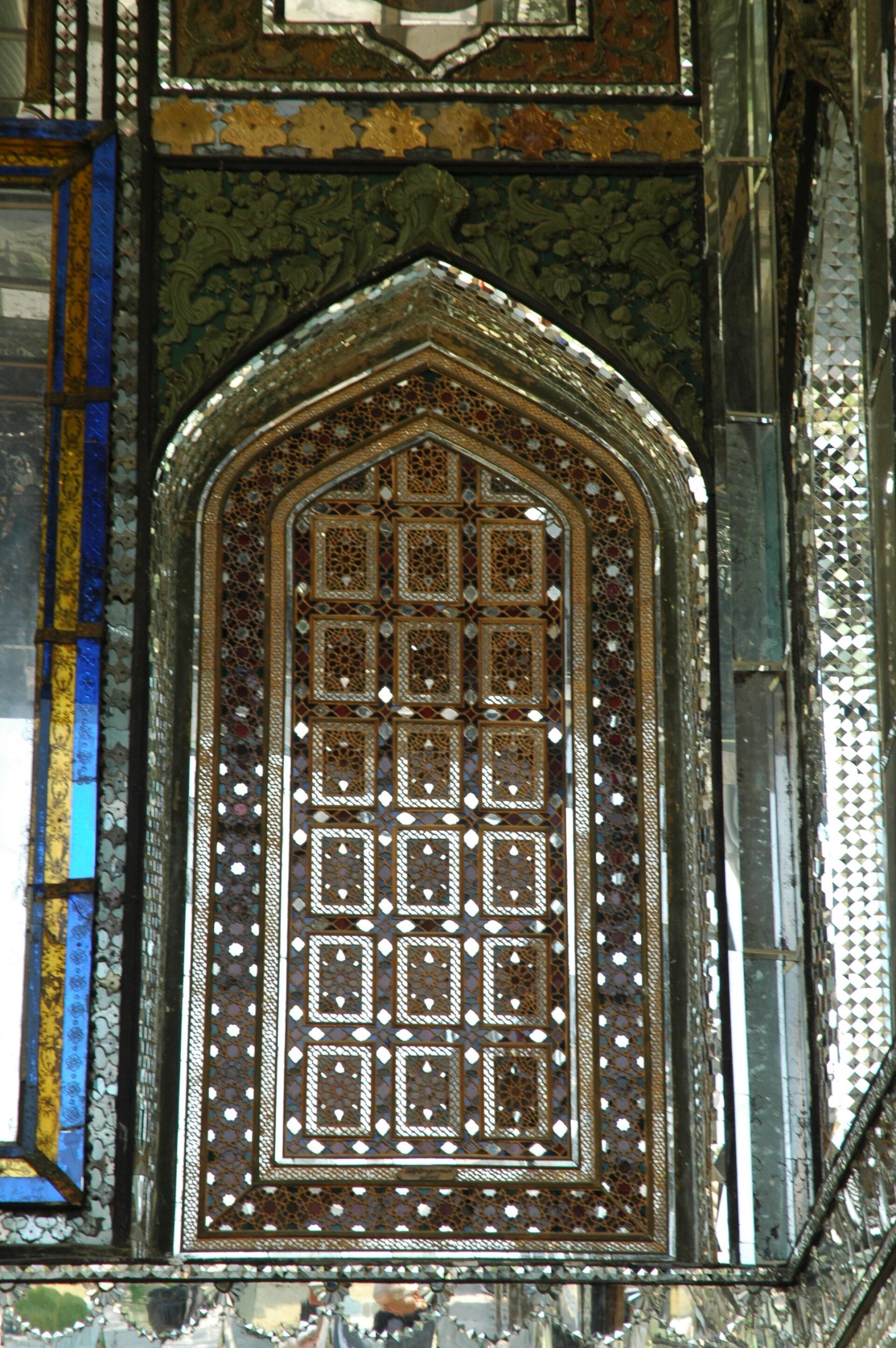 A decorated facade of the palace, glowing with brilliant Qajar tilework.