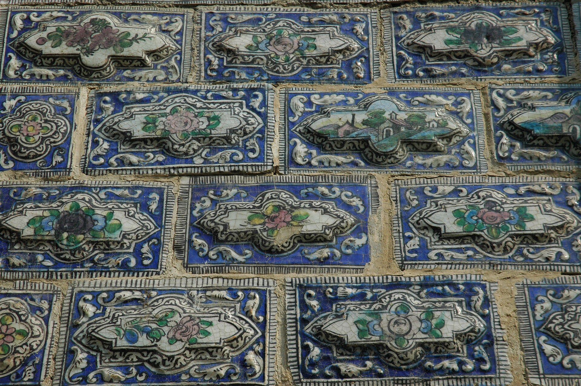 A richly decorated interior of the palace, sparkling with mirror-work.
