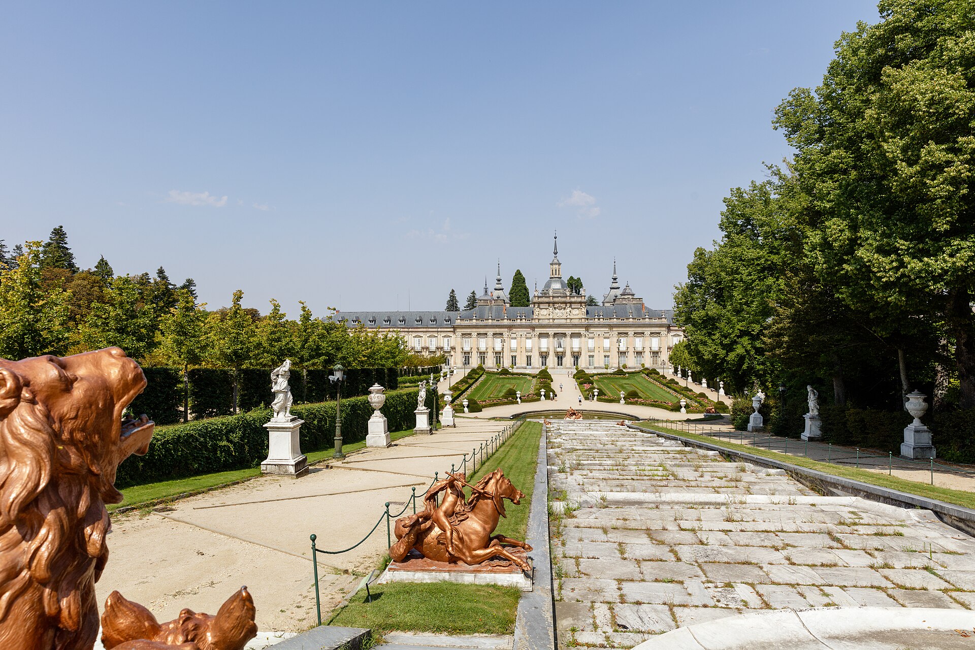 The gardens of La Granja spread beneath the mountains