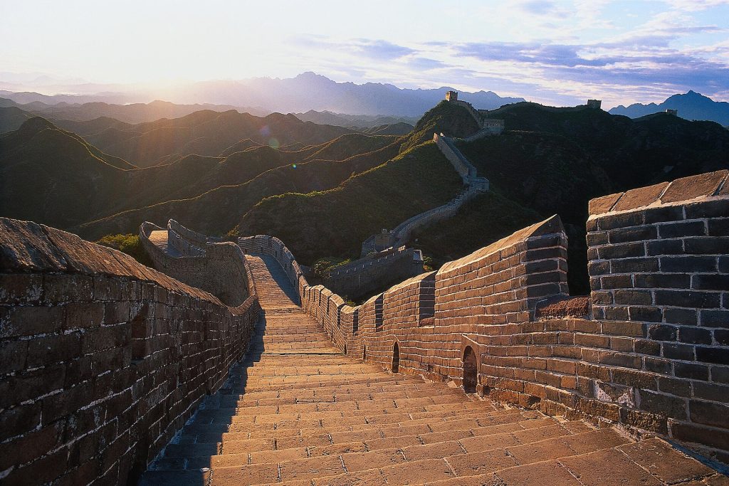 The Great Wall of China snaking across the mountain ridges