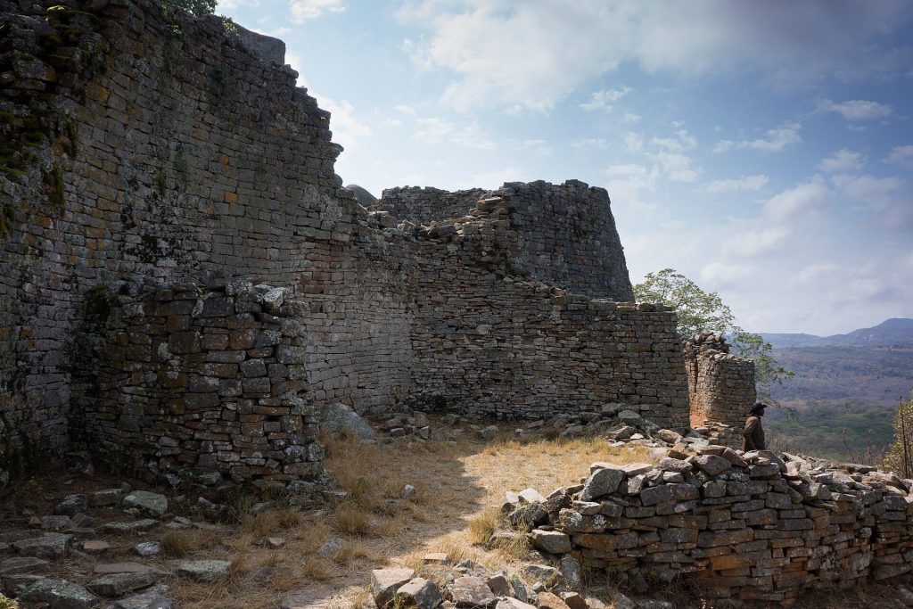 Visitors exploring the stone ruins of Great Zimbabwe today