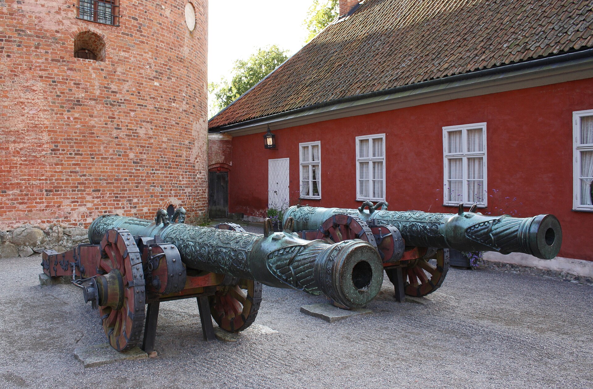 Two great captured cannon, nicknamed the Boar and the Sow, guard the castle gate.