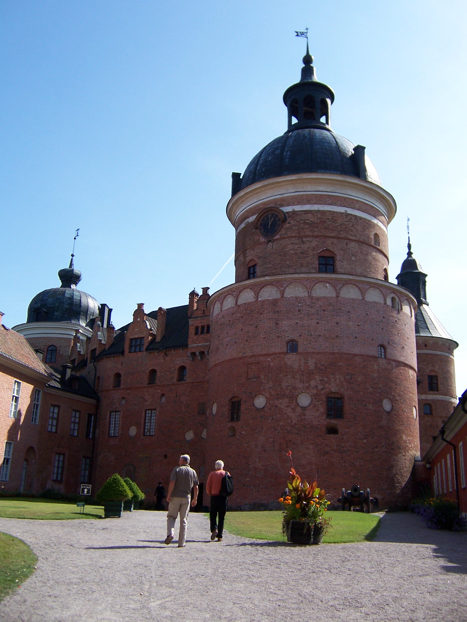 The compact courtyards and thick walls recall the castle's origins as a powerful fortress.