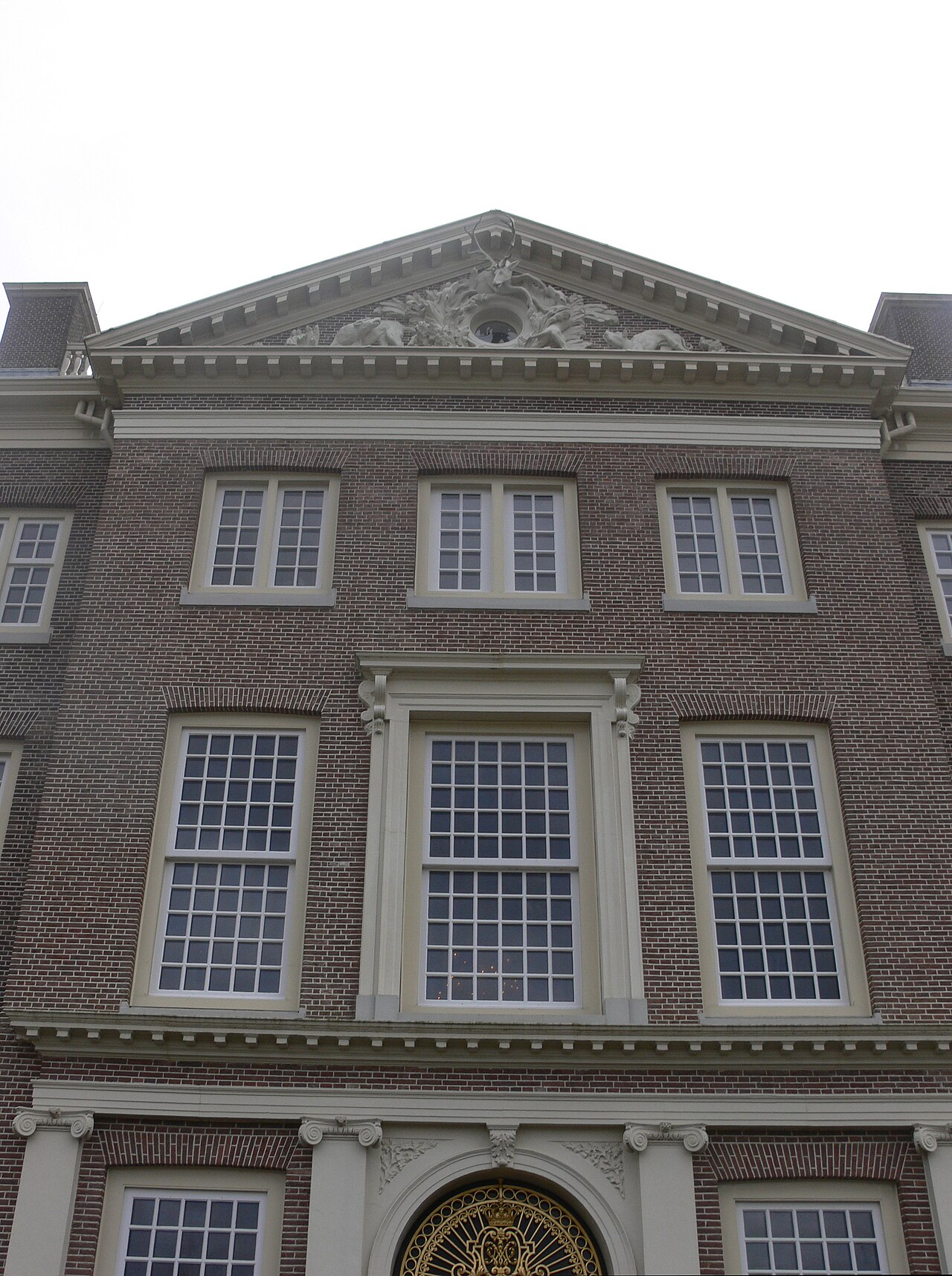 The garden facade of Het Loo above its Baroque parterres.