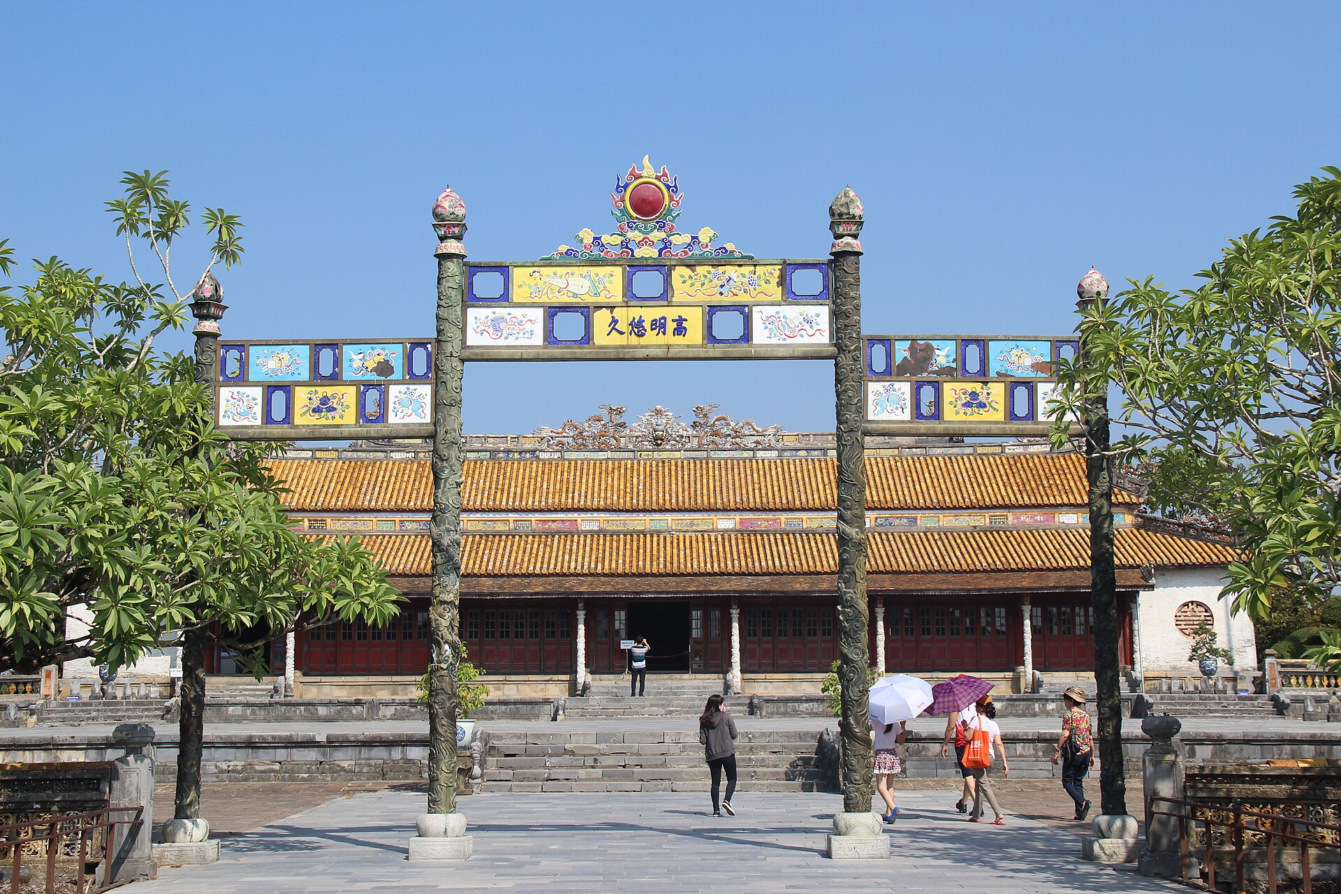 Inside the hall of supreme harmony, red and gold beneath a carved roof