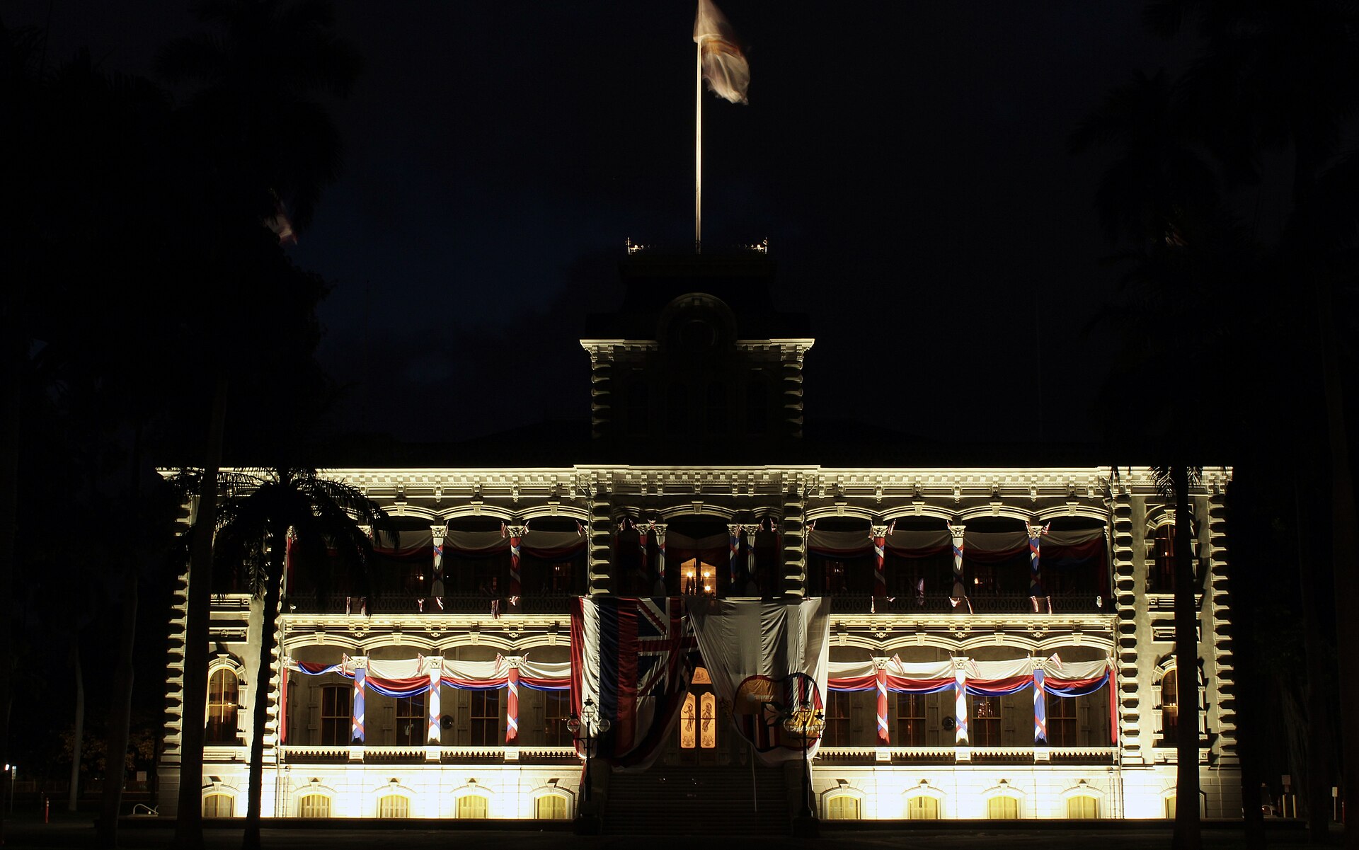 The palace at dawn, its towers and verandas dignified against the sky.