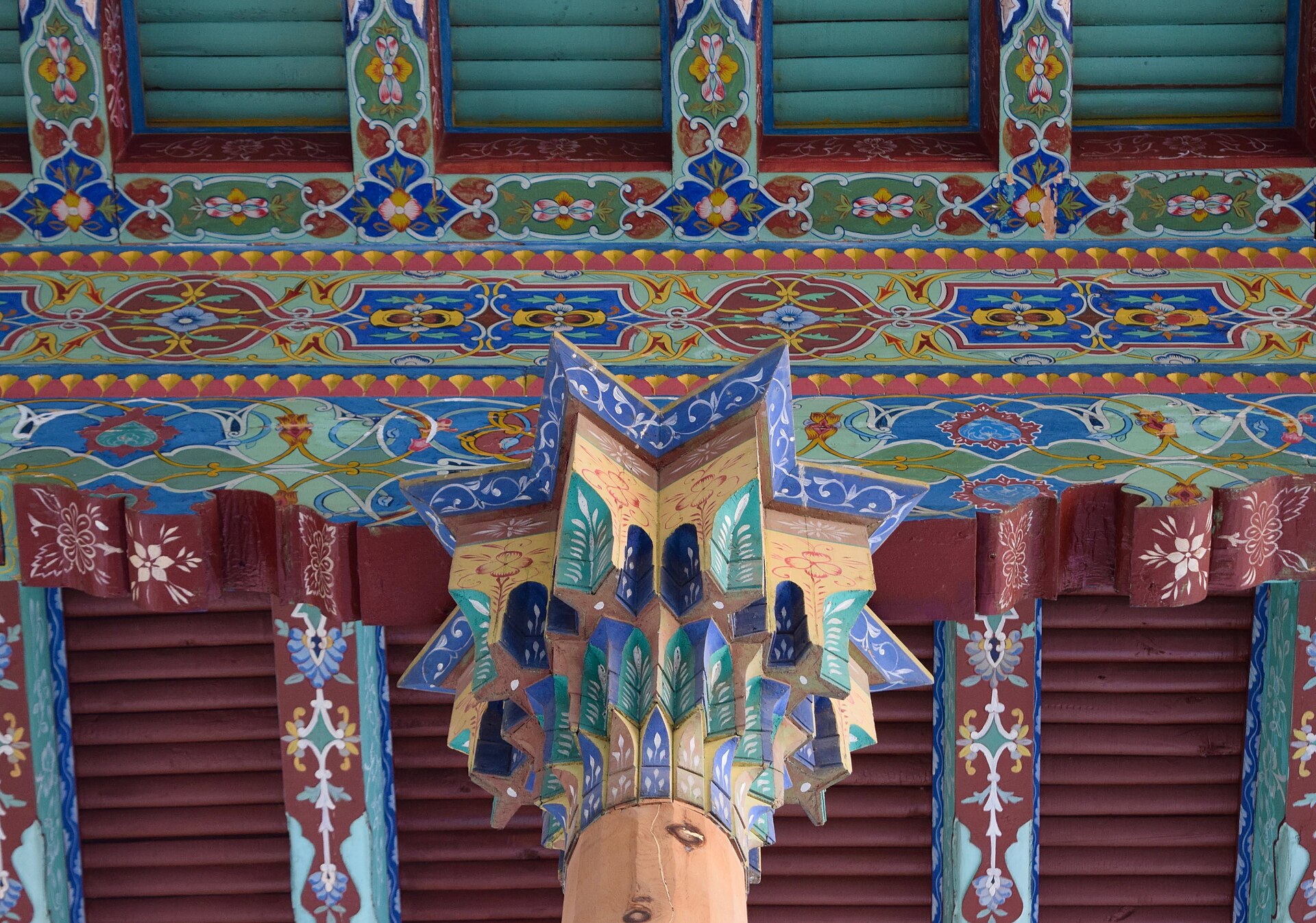 A richly painted ceiling within the palace interior