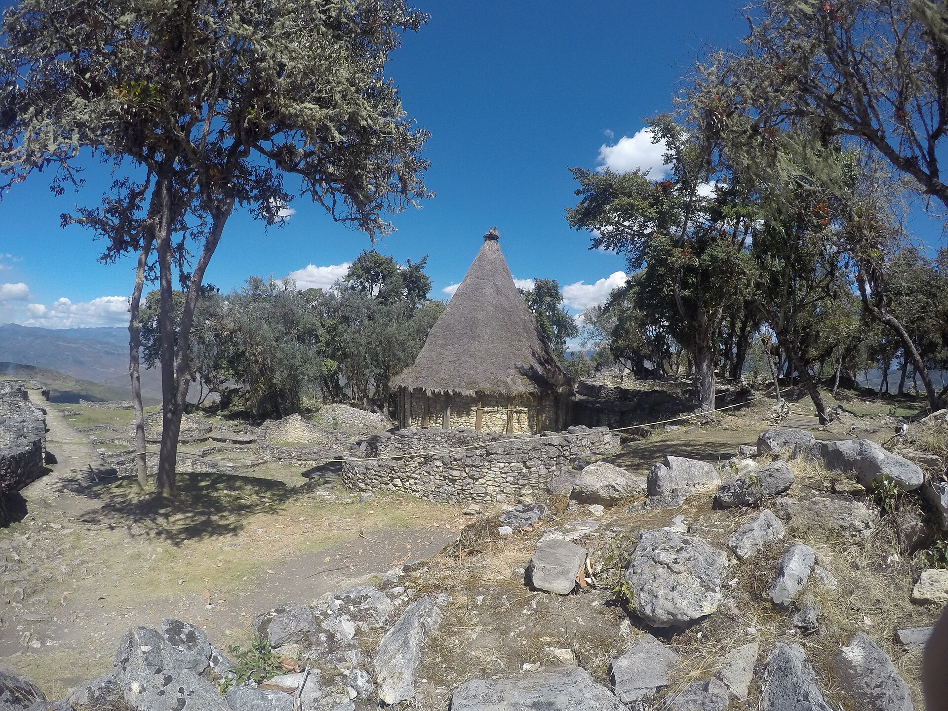 A circular stone house within Kuélap