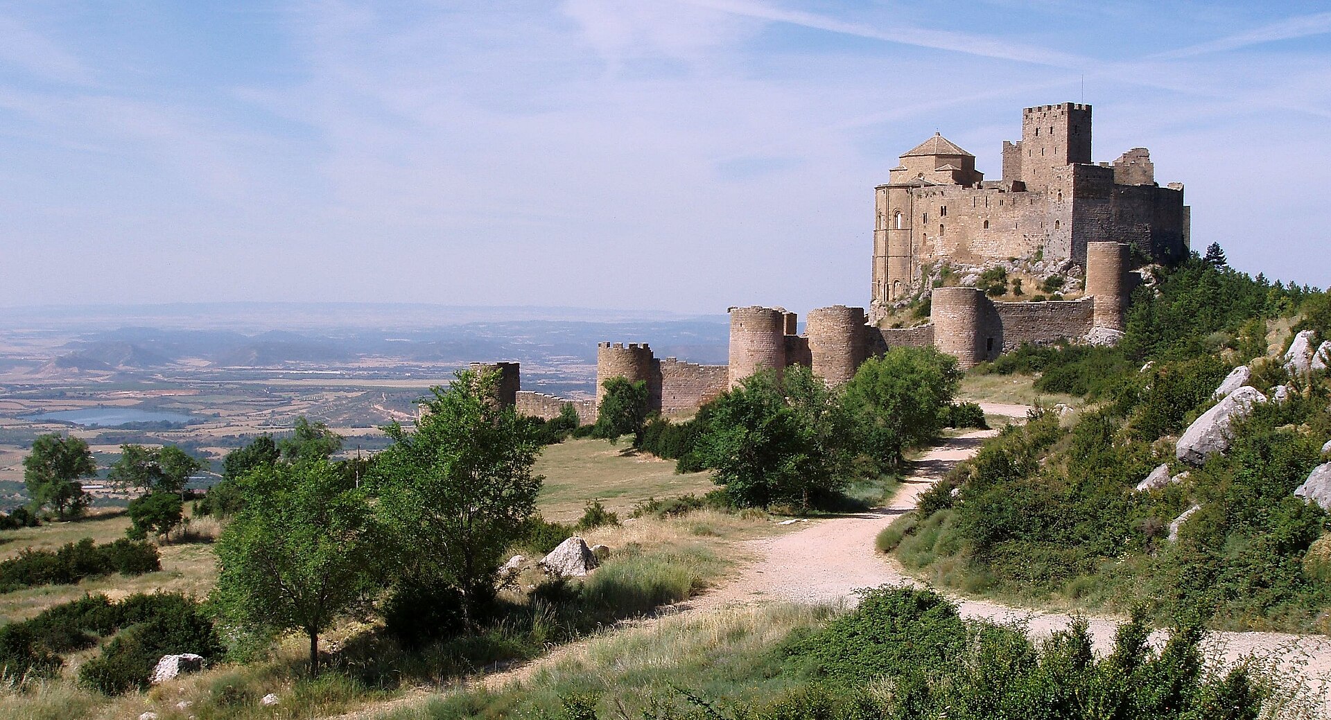 Loarre rises straight from a great outcrop of grey stone in the Pyrenean foothills.