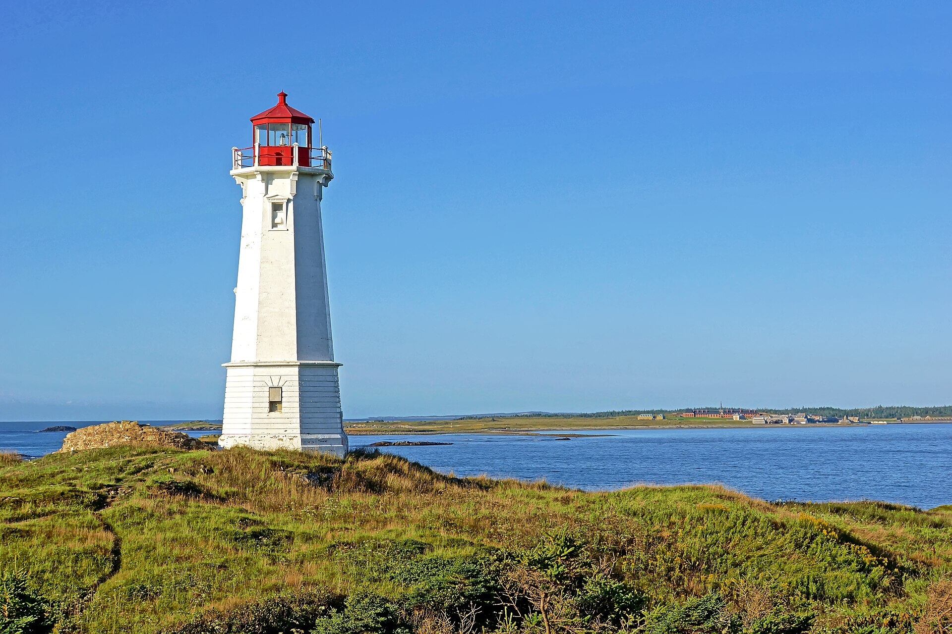 The Louisbourg lighthouse and the fortress across the harbour