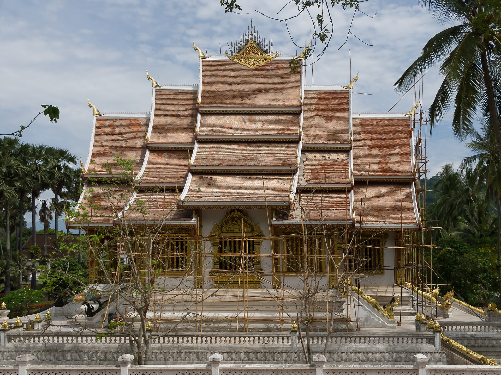 The tiered golden roof of the shrine of the sacred Pha Bang