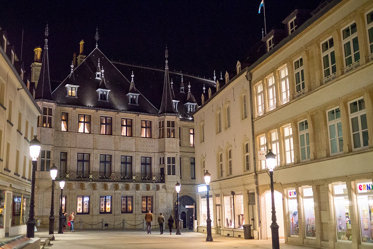 The palace illuminated at night.