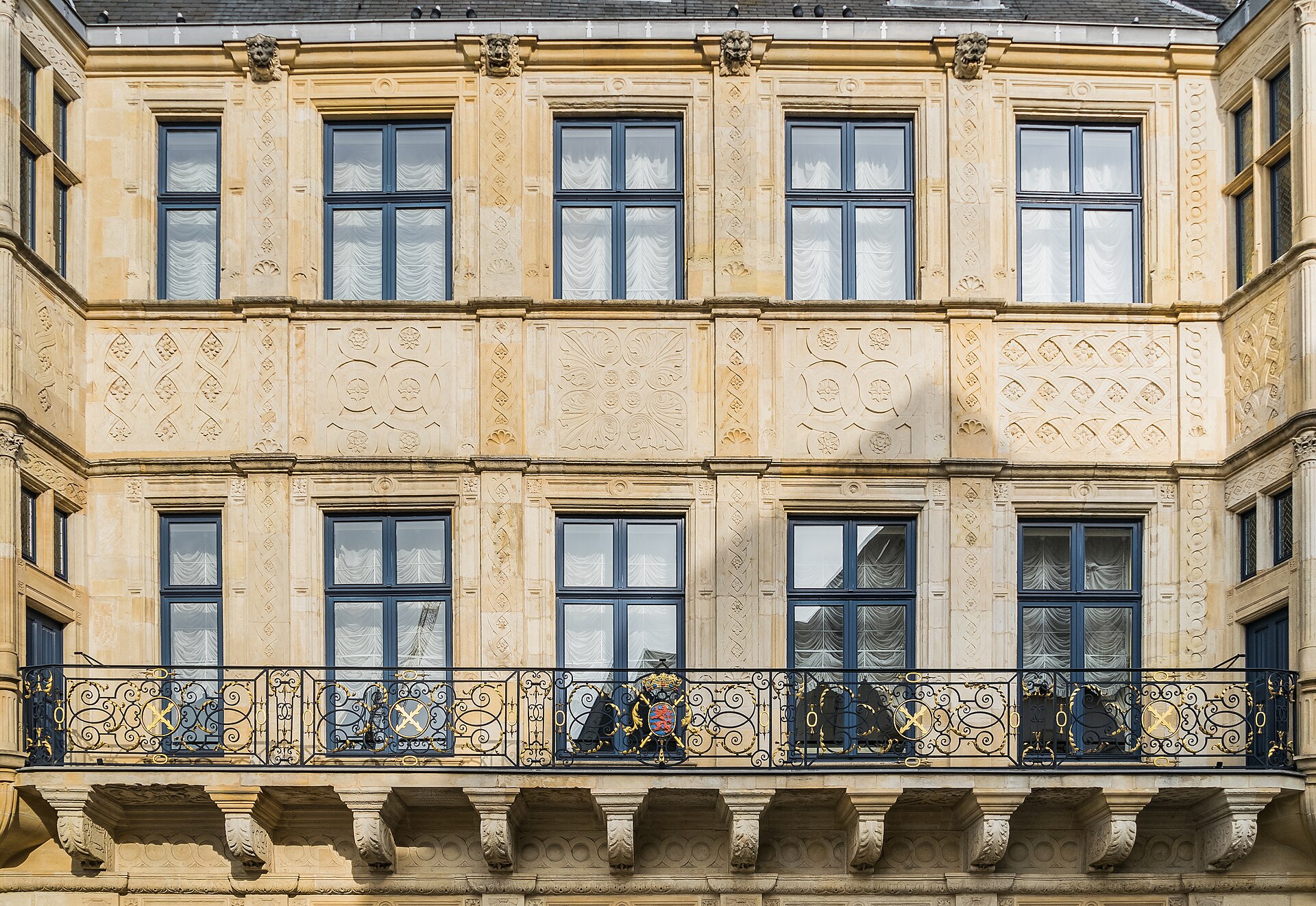The palace rising from a street in the old town