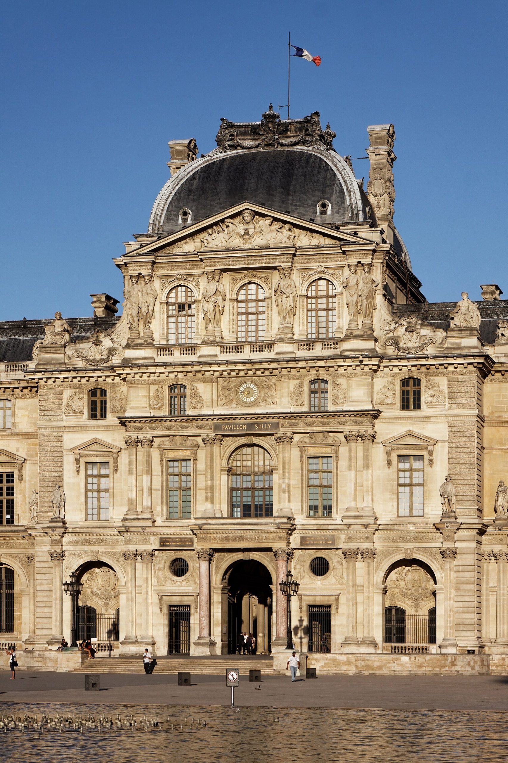 The square court and colonnade crown the classical Louvre