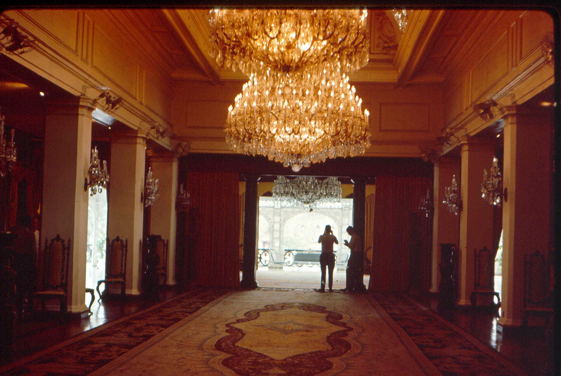 Chandeliers and hardwood detailing in the state rooms